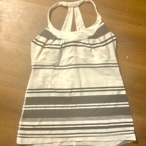 Lululemon Athletics black and white striped woman’s size large sports top